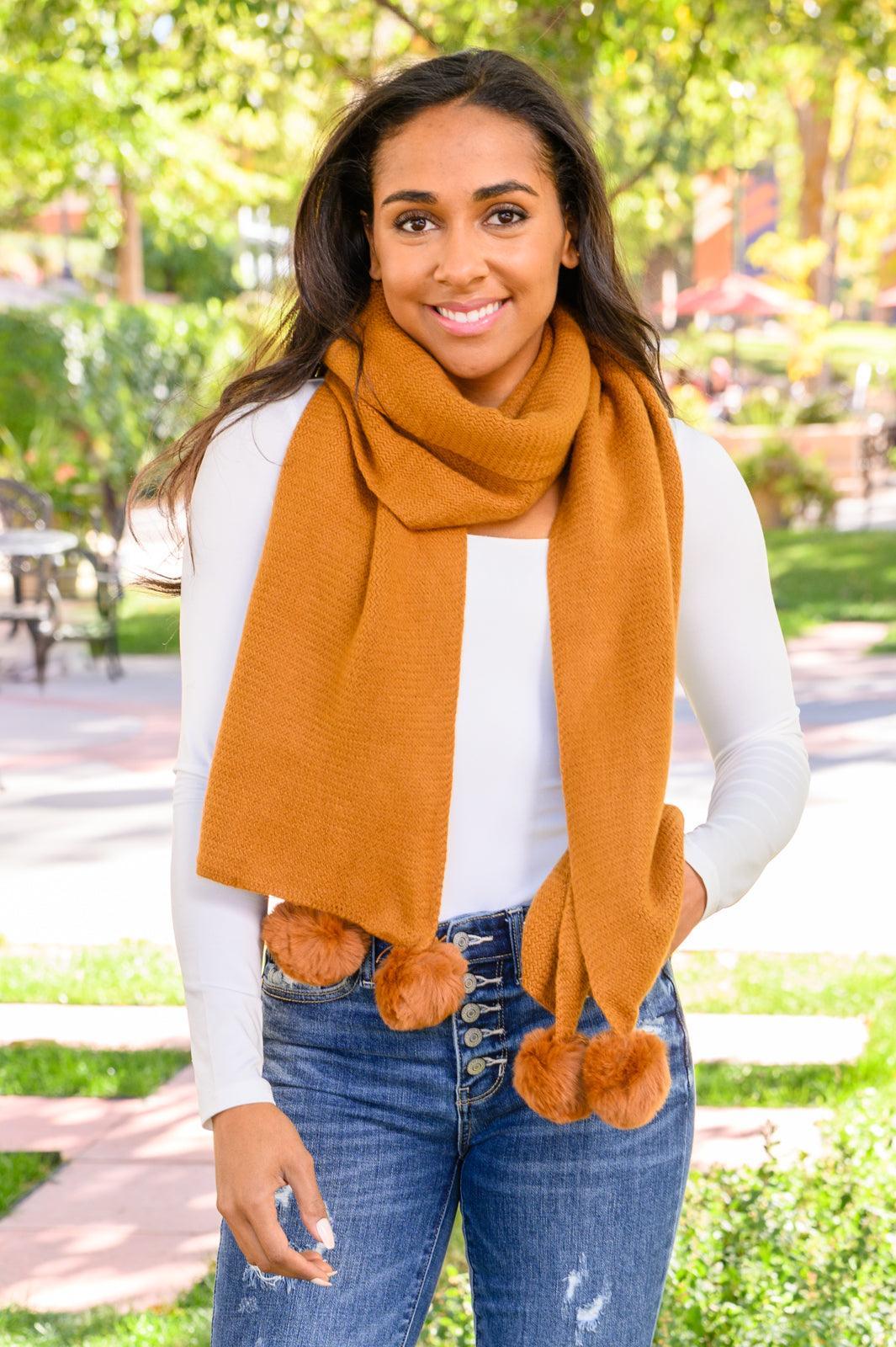 Hazel Blues® | Knitted Fuzzy Pom Pom Scarf In Ginger